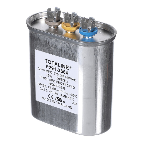 A metallic cylindrical capacitor with three labeled terminals (brown, yellow, and blue) and a white label displaying technical specifications.
