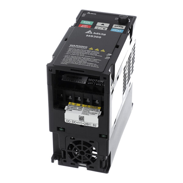 A black electronic device with labeled buttons, warning labels, terminal connections, and a cooling fan, likely an industrial control unit.