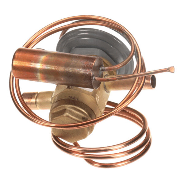 A brass and copper valve assembly with coiled copper tubing and a cylindrical component attached.