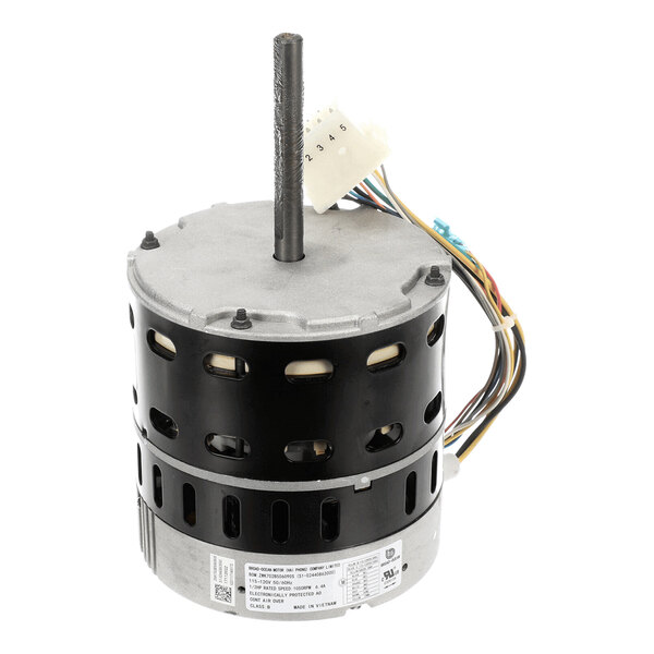 A cylindrical electric motor with a central shaft, multiple colored wires, and a white connector attached.