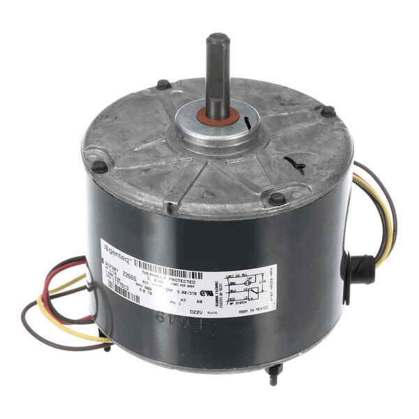 A cylindrical electric motor with a central shaft, multiple colored wires, and a label with technical specifications attached to the side.