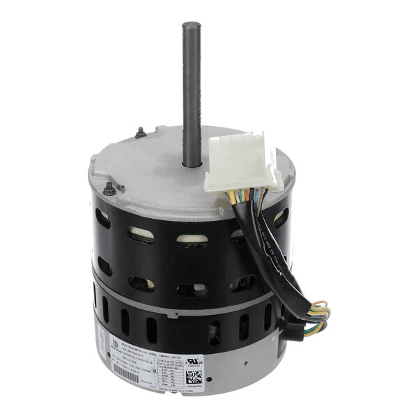 A cylindrical electric motor with a central shaft, multiple ventilation slots, attached wiring, and a white connector.