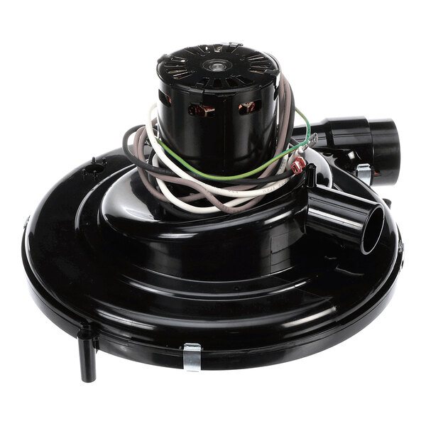 A black circular mechanical component with a motor on top and several wires attached, featuring a cylindrical outlet and inlet.