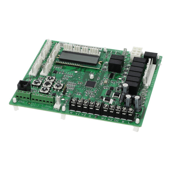 A green printed circuit board with various electronic components, connectors, buttons, and a small display screen.