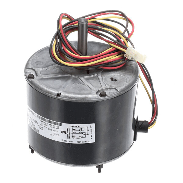 A cylindrical electric motor with a central shaft, attached wires, and a label with technical specifications.