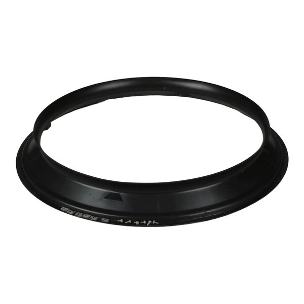 A black circular plastic ring with a slightly raised edge and some small white markings on one side.