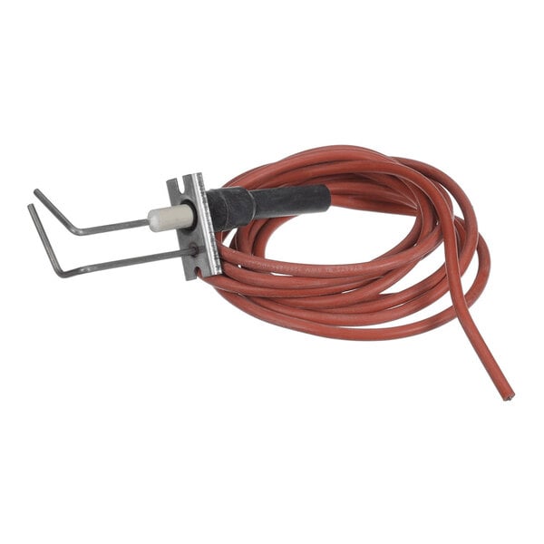 A coiled red wire attached to a metal bracket with two prongs and a white ceramic component.