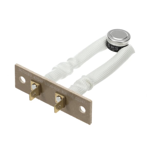 A small electronic component with two white insulated wires connected to a metal-capped sensor and mounted on a rectangular board with two metal terminals.