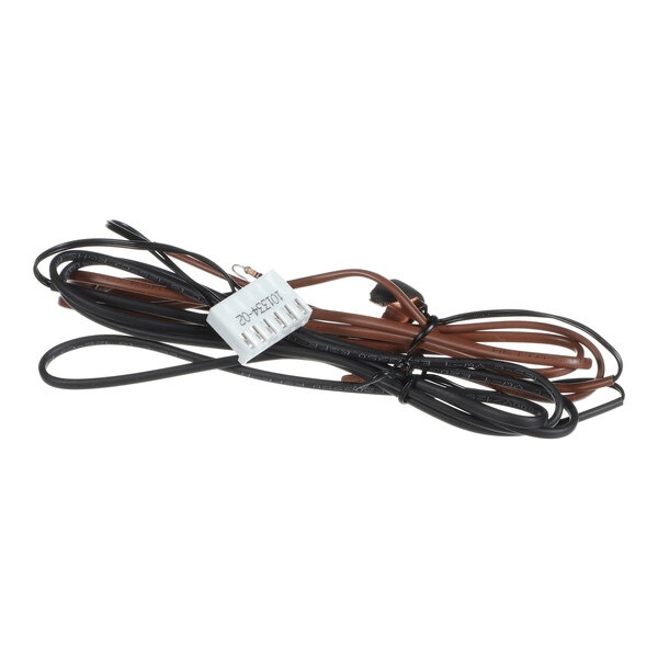 A coiled bundle of black and brown wires with a white plastic connector attached.
