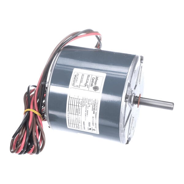 A cylindrical electric motor with attached wiring and a visible label, featuring a protruding shaft on one end.