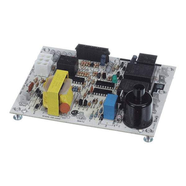 A rectangular electronic circuit board with various components including capacitors, resistors, relays, and connectors mounted on it.
