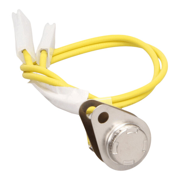 A small metallic component with a round top, attached to two yellow wires with white connectors.