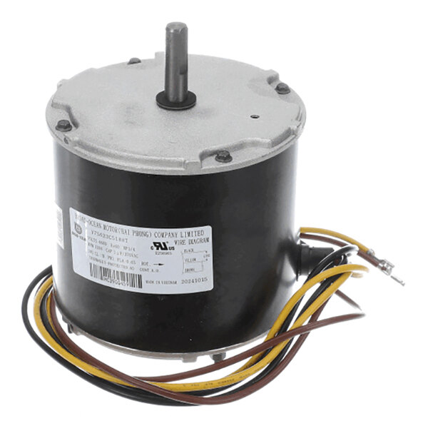 A cylindrical electric motor with a metal shaft protruding from the top and several colored wires extending from the side.
