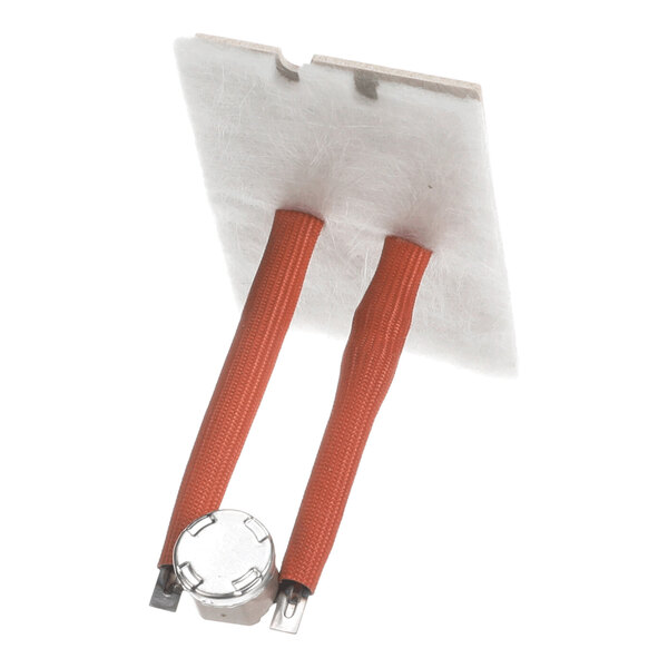 A component with two orange insulated wires attached to a white rectangular pad and a small metallic part at the end of the wires.