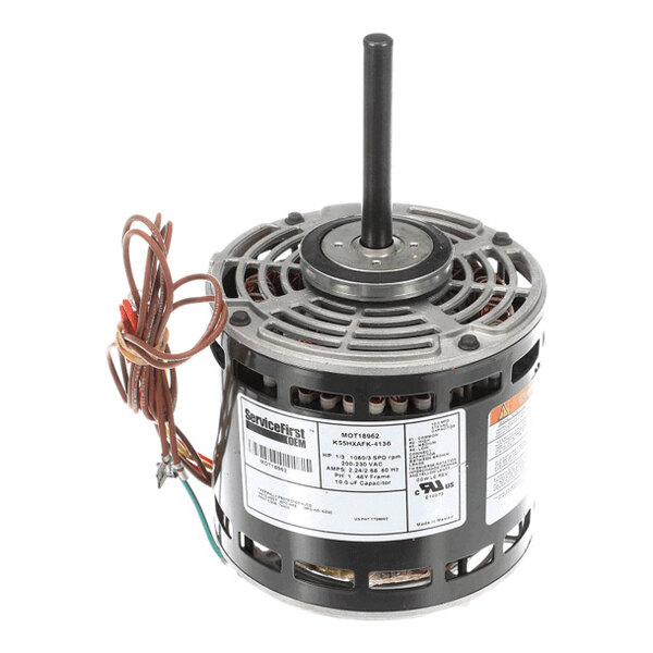 A cylindrical electric motor with a central shaft, ventilation openings, and attached wires, featuring a label with technical specifications.
