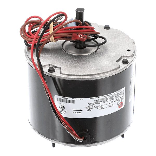 A cylindrical electric motor with attached red and black wires, a metal top plate, and a label with specifications.