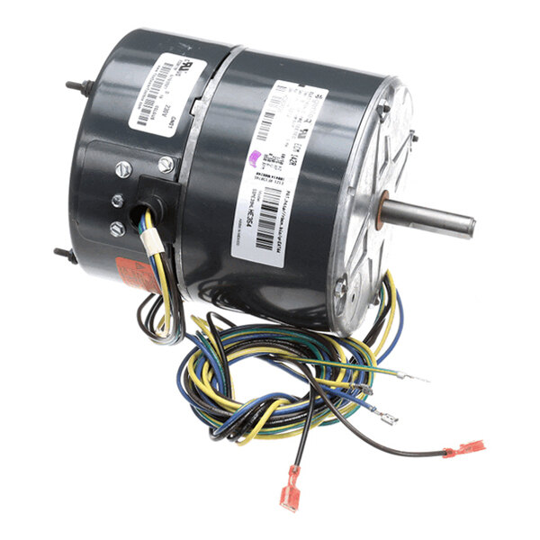 A cylindrical electric motor with a metal shaft and several colored wires extending from its side, featuring multiple labels and barcodes on its surface.