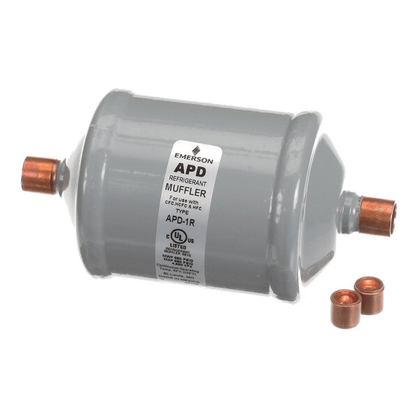 A gray cylindrical metal component with copper fittings on both ends and three additional copper pieces beside it, labeled as a refrigerant muffler.