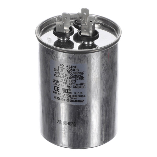 A cylindrical metallic component with three pairs of electrical terminals on top and a label with technical specifications on the side.