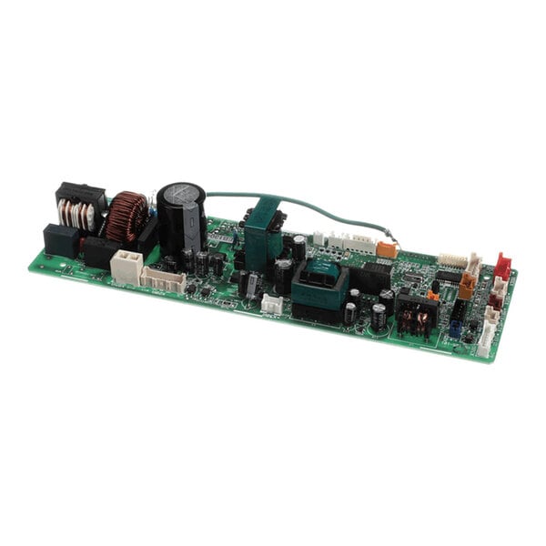 A green printed circuit board with various electronic components such as capacitors, coils, connectors, and integrated circuits mounted on it.