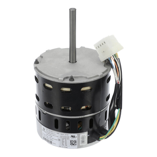 A cylindrical electric motor with a central shaft, multiple ventilation slots, and attached colored wires ending in a white connector.