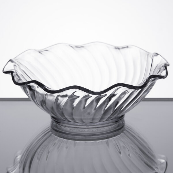 A clear glass Carlisle tulip berry dish with a rippled edge.