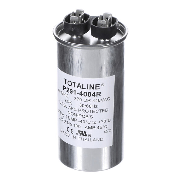 A cylindrical metal capacitor with two black terminal connectors on top and a white label displaying technical specifications.