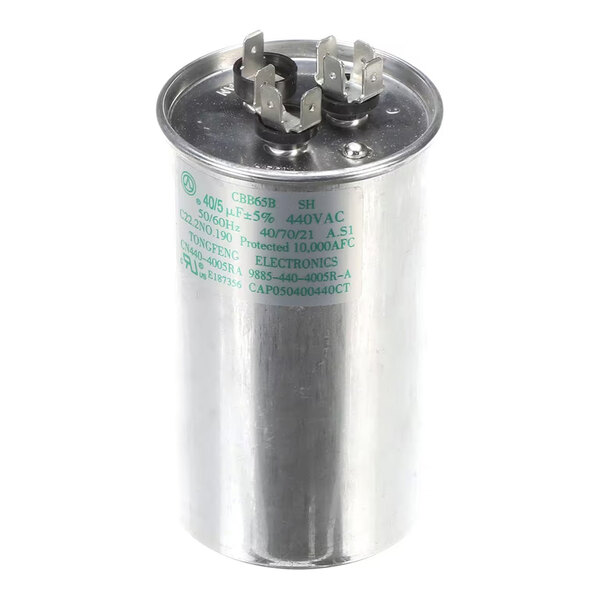 A cylindrical metal capacitor with three electrical terminals on top and printed specifications on the side.