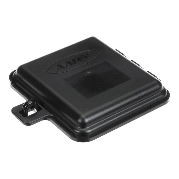 A black, square-shaped plastic cover with a hinged design and a small latch on one side.