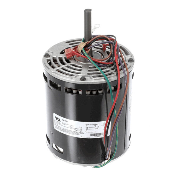 A cylindrical electric motor with a metal shaft on top and several colored wires extending from the top.