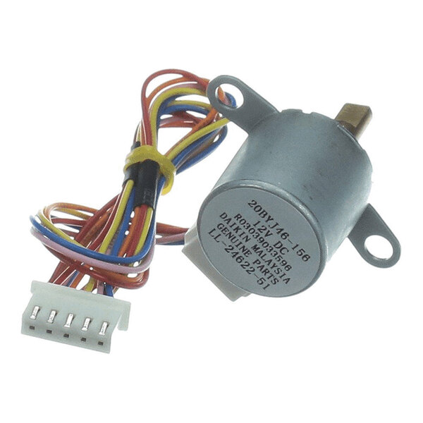 A small cylindrical electric motor with a set of multicolored wires and a white connector attached.