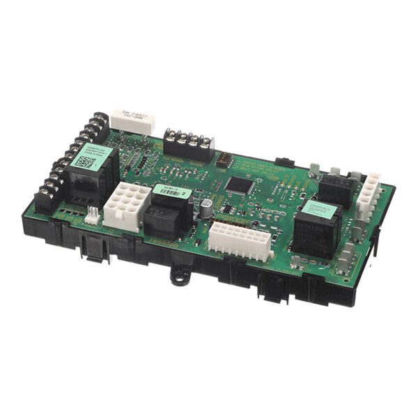 A green electronic circuit board with various connectors, relays, and components mounted on a black base.