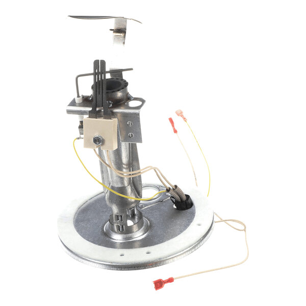 A metallic burner assembly with attached wires and connectors, mounted on a circular base.