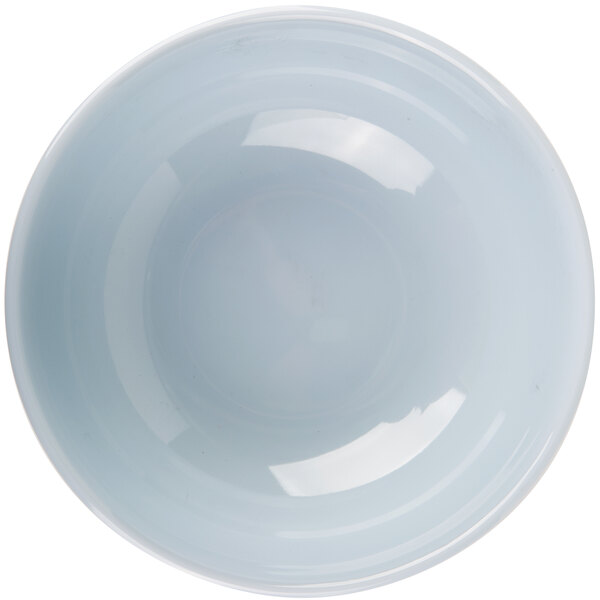 A white bowl with a blue rim.