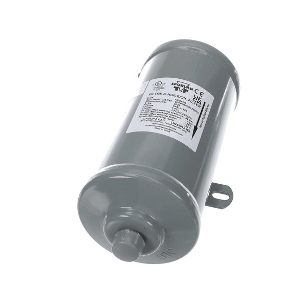 A cylindrical metallic component with a label and mounting bracket, likely used as a filter in mechanical systems.