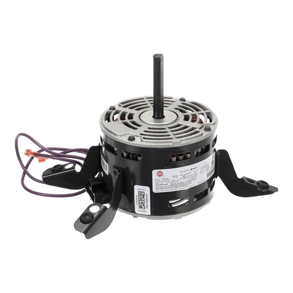A cylindrical electric motor with a central shaft, mounting brackets, and attached wires.