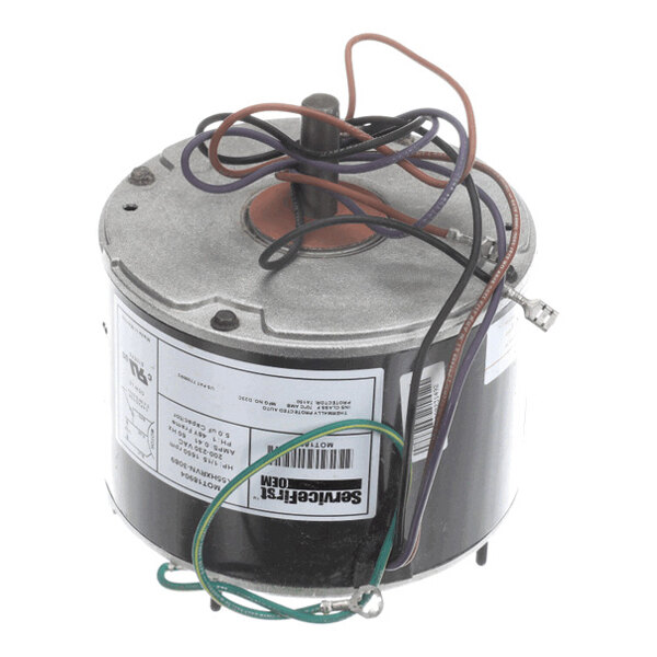A cylindrical electric motor with several colored wires extending from the top and labels on the side.