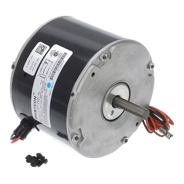 A cylindrical electric motor with a metal shaft, attached wires, and a label with technical specifications.