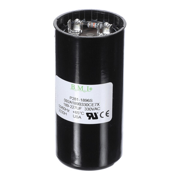 A cylindrical black capacitor with exposed terminals on top and a white label displaying technical specifications.