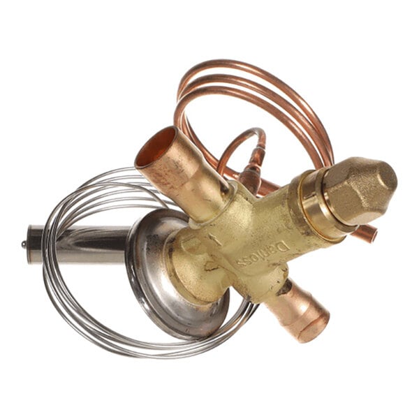 A brass and copper mechanical valve assembly with coiled tubing and multiple pipe connections.