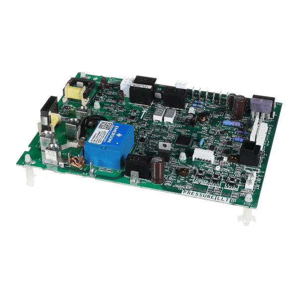 A green electronic circuit board with various components including capacitors, resistors, connectors, and a blue relay module.