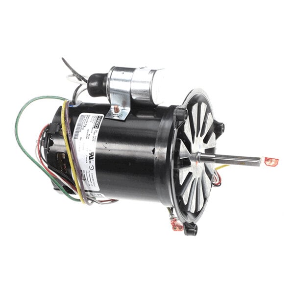 A black cylindrical electric motor with attached wires, a metal mounting bracket, and a fan-like component on one end.
