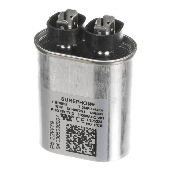 A metallic cylindrical capacitor with two black terminal connectors on top and a label displaying technical specifications and a QR code.