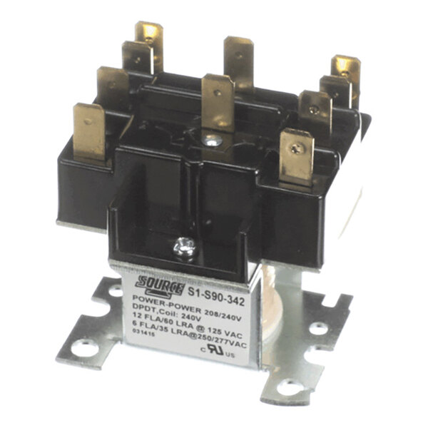 A black and metallic electrical relay with multiple brass terminals and a labeled base plate.