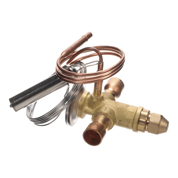 A brass and copper valve assembly with coiled tubing and multiple connection points, likely used in refrigeration or HVAC systems.