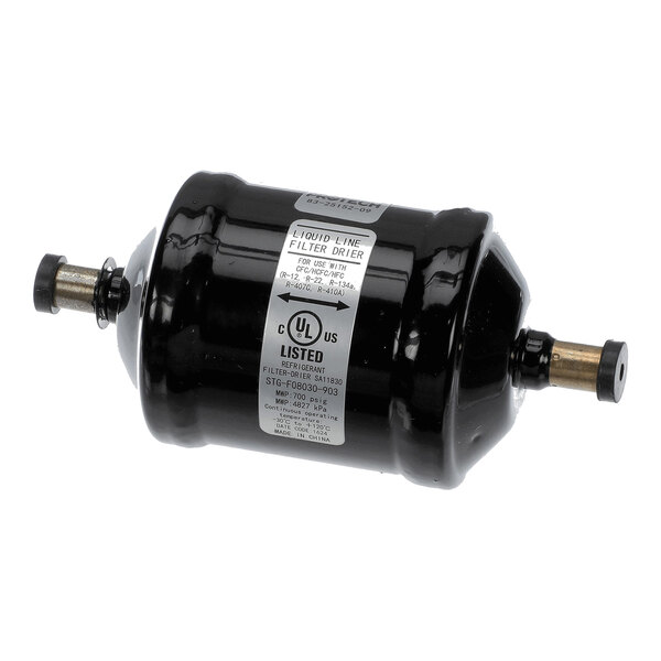 A cylindrical black metal component with two brass fittings on either end and a label in the center.