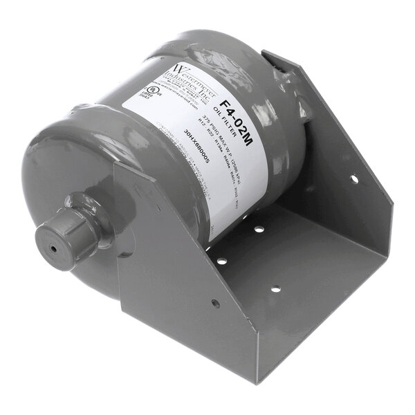 A cylindrical metal component with a label, mounted on a gray metal bracket with multiple holes.