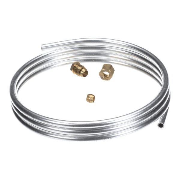 A coiled aluminum tube with three small brass fittings placed inside the coil, all set against a white background.