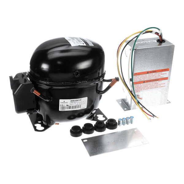 A black metal compressor unit with attached wiring, a metal control box with colored wires, rubber grommets, metal mounting plates, and screws, all arranged on a white background.