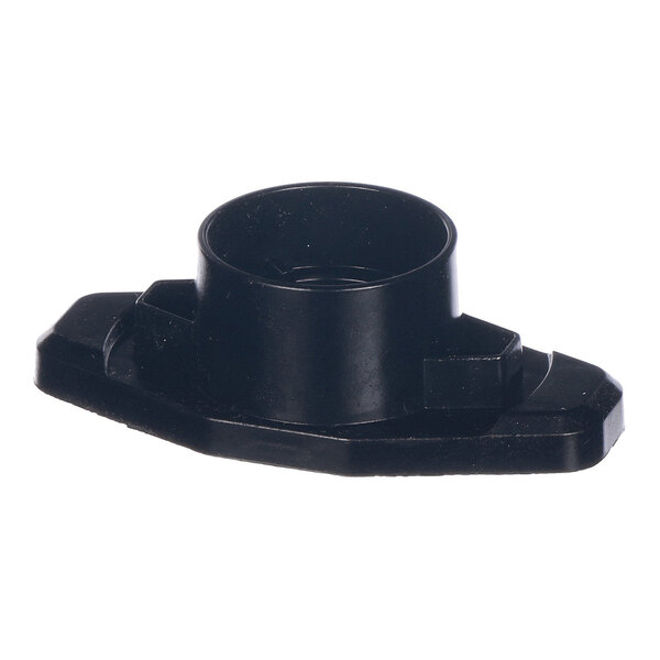 A black plastic component with a cylindrical center and an oval base, featuring angular edges and raised sections.